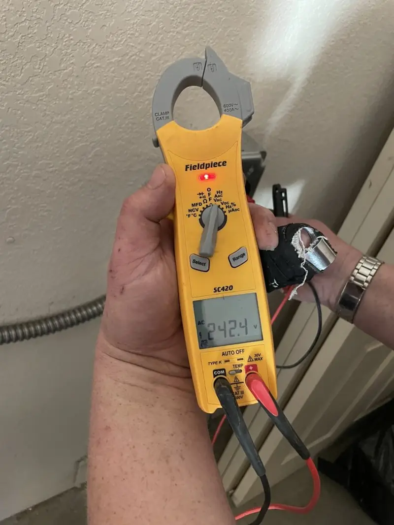 Voltage testing with clamp meter during Generator Installation in Waterville